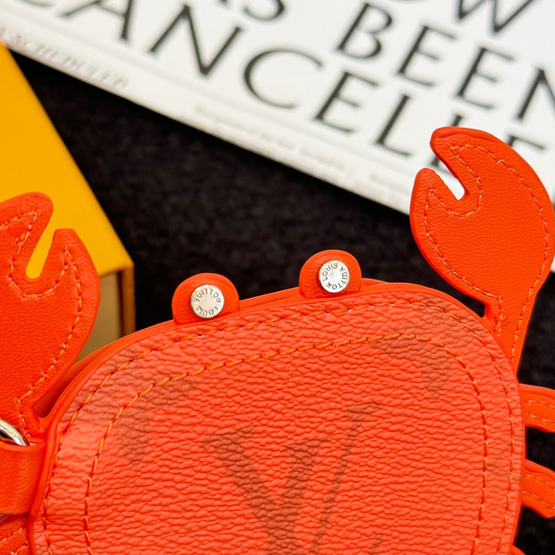 LV Orange Crab Bag Charm M01929